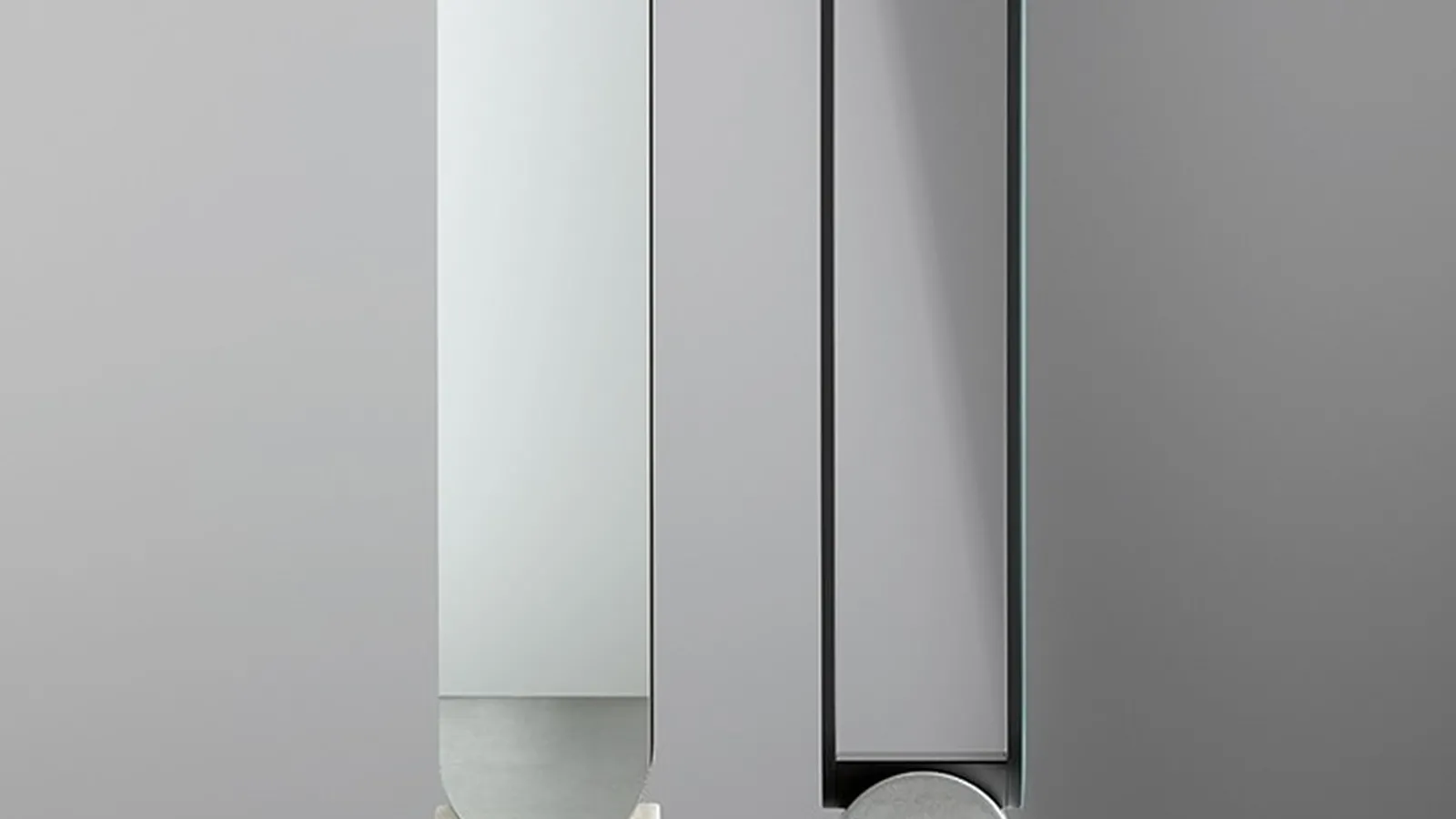 Specchio Vague Mirror con cornice in metallo e base in cemento di Bonaldo