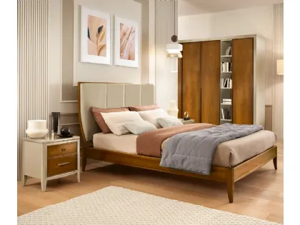 Letto Armonia in legno con testiera in pelle di Le Fablier